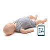life like baby manikin with grey and white striped vest on used for first aid training
