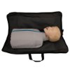 Laerdal Little Junior QCPR paediatric training manikin with light skin lying inside an open black carry bag