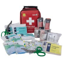 Tourniquet tourniquet kit contents including gloves, bandages, scissors, and other first aid items displayed with a red bag