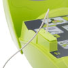 a close up view of the green pad connector inserted into the training aed with the defib lid open