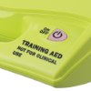 Closeup of the on/off button on the zoll aed plus trainer 2 with training aed warning text visible