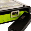 A close-up of a black defibrillator battery and its connector port