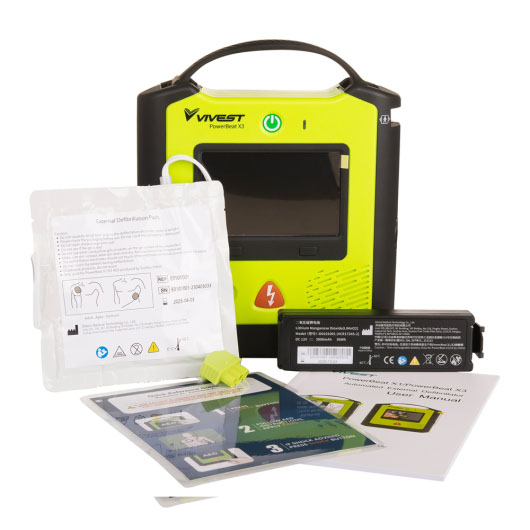 A bright yellow and black defibrillator with the full contents of the package