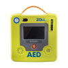 A bright green defibrillator with a large grey LCD screen