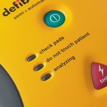 Defibtech Lifeline AED equiped with two bright operation buttons